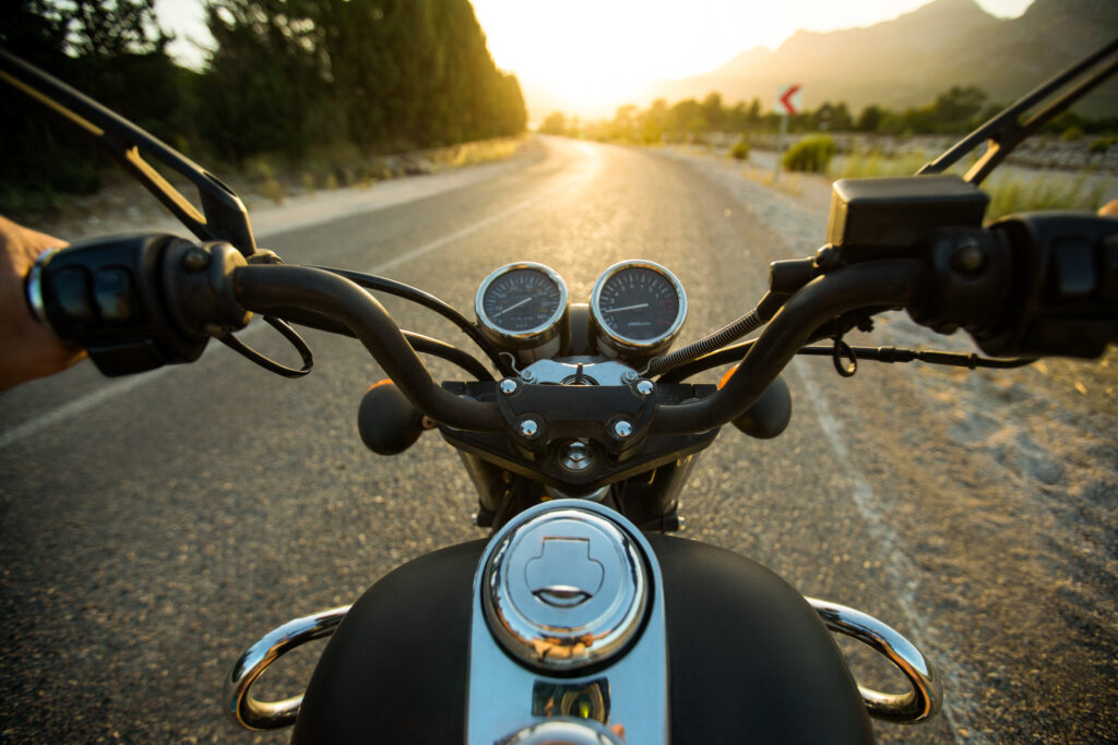 Traveling on a motorcycle on the roads pov from the driver