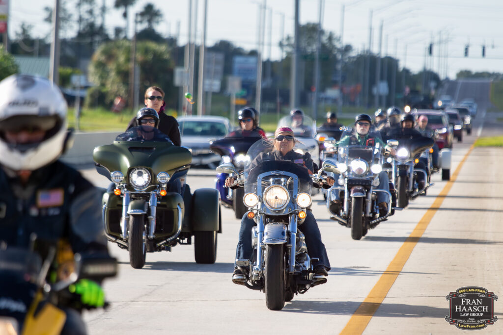 motorcyclists riding down a florida highway with license plates